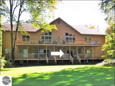 Enjoy resort-style living in this beautifully furnished condo on Schuss Mountain Golf Club in Michigan - for sale on GolfHomes.com, golf home, golf lot