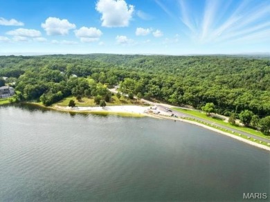 Lake Front Lot on Almost 1/2 Acre Lot on Small Private Lake on Raintree Country Club in Missouri - for sale on GolfHomes.com, golf home, golf lot