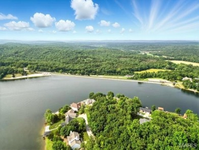 Lake Front Lot on Almost 1/2 Acre Lot on Small Private Lake on Raintree Country Club in Missouri - for sale on GolfHomes.com, golf home, golf lot