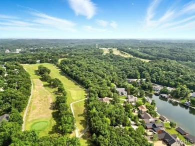 Lake Front Lot on Almost 1/2 Acre Lot on Small Private Lake on Raintree Country Club in Missouri - for sale on GolfHomes.com, golf home, golf lot