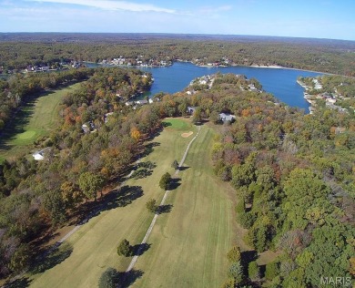 Lake Front Lot on Almost 1/2 Acre Lot on Small Private Lake on Raintree Country Club in Missouri - for sale on GolfHomes.com, golf home, golf lot