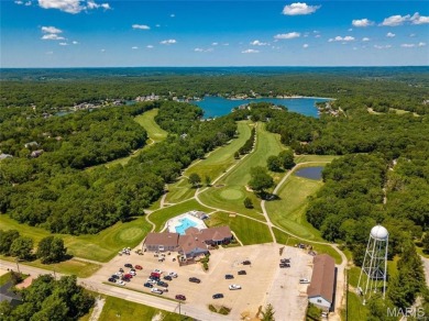 Lake Front Lot on Almost 1/2 Acre Lot on Small Private Lake on Raintree Country Club in Missouri - for sale on GolfHomes.com, golf home, golf lot