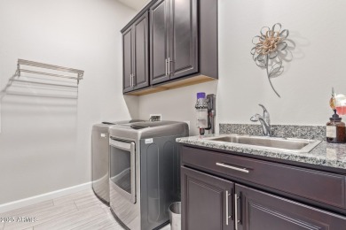 Discover this beautifully upgraded home in the highly on Verrado Golf Club - Victory in Arizona - for sale on GolfHomes.com, golf home, golf lot