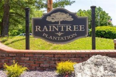 Lake Front Lot on Almost 1/2 Acre Lot on Small Private Lake on Raintree Country Club in Missouri - for sale on GolfHomes.com, golf home, golf lot