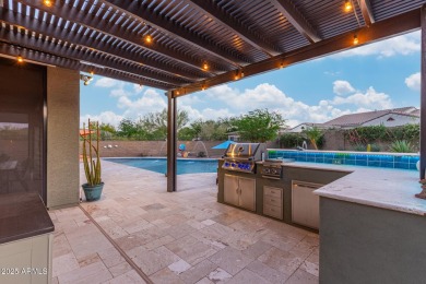 Discover this beautifully upgraded home in the highly on Verrado Golf Club - Victory in Arizona - for sale on GolfHomes.com, golf home, golf lot