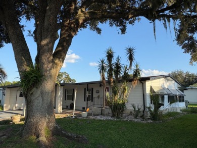Very spacious canal front two bedroom, two bath home with a on Golden Lakes Golf Course in Florida - for sale on GolfHomes.com, golf home, golf lot
