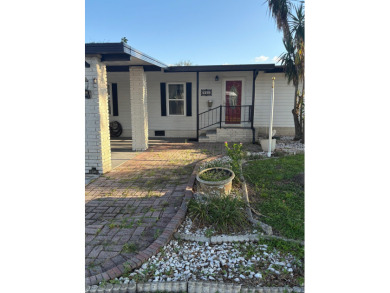 Very spacious canal front two bedroom, two bath home with a on Golden Lakes Golf Course in Florida - for sale on GolfHomes.com, golf home, golf lot