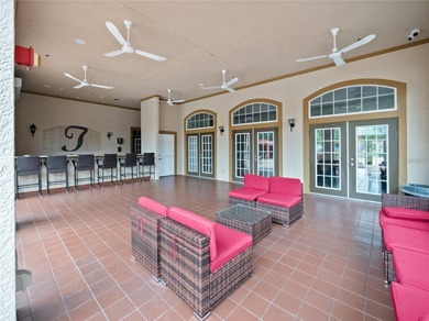 Discover resort-style living in this well-maintained 2-bedroom on ChampionsGate Golf Resort in Florida - for sale on GolfHomes.com, golf home, golf lot
