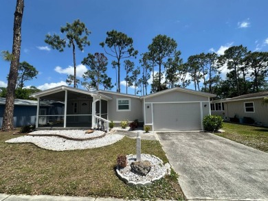 Lot rent is $1037.00    This beautiful 2 bedroom, 2 bathroom on Del Tura Golf and Country Club in Florida - for sale on GolfHomes.com, golf home, golf lot