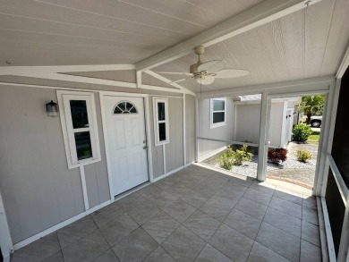 Lot rent is $1037.00    This beautiful 2 bedroom, 2 bathroom on Del Tura Golf and Country Club in Florida - for sale on GolfHomes.com, golf home, golf lot
