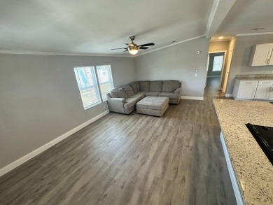 Lot rent is $1037.00    This beautiful 2 bedroom, 2 bathroom on Del Tura Golf and Country Club in Florida - for sale on GolfHomes.com, golf home, golf lot