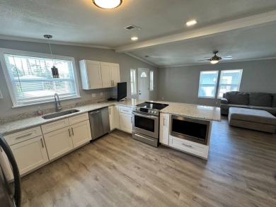 Lot rent is $1037.00    This beautiful 2 bedroom, 2 bathroom on Del Tura Golf and Country Club in Florida - for sale on GolfHomes.com, golf home, golf lot