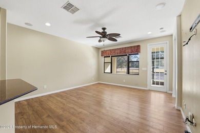 One or more photo(s) has been virtually staged. Tucked within on Brookridge Country Club in Florida - for sale on GolfHomes.com, golf home, golf lot