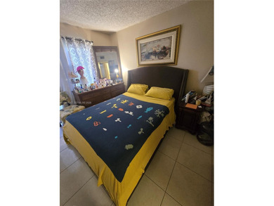 This inviting 2-bedroom, 1.5-bathroom condo on the 2nd floor on Flamingo Lakes Country Club in Florida - for sale on GolfHomes.com, golf home, golf lot