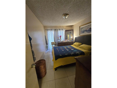 This inviting 2-bedroom, 1.5-bathroom condo on the 2nd floor on Flamingo Lakes Country Club in Florida - for sale on GolfHomes.com, golf home, golf lot