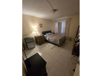 This inviting 2-bedroom, 1.5-bathroom condo on the 2nd floor on Flamingo Lakes Country Club in Florida - for sale on GolfHomes.com, golf home, golf lot