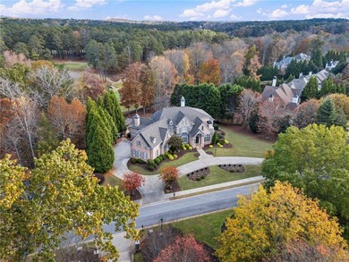 Stunning elegance overlooking the 14th green in gated White on White Columns Country Club in Georgia - for sale on GolfHomes.com, golf home, golf lot