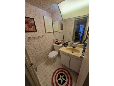 This inviting 2-bedroom, 1.5-bathroom condo on the 2nd floor on Flamingo Lakes Country Club in Florida - for sale on GolfHomes.com, golf home, golf lot