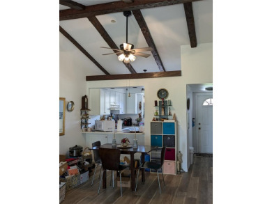 Easy Living Awaits - Ideal Villa for Retirees in Peaceful North on Sabal Trace Golf and Country Club in Florida - for sale on GolfHomes.com, golf home, golf lot