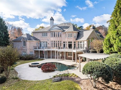 Stunning elegance overlooking the 14th green in gated White on White Columns Country Club in Georgia - for sale on GolfHomes.com, golf home, golf lot