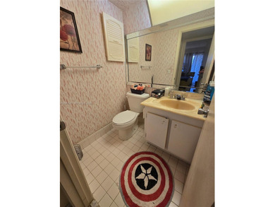 This inviting 2-bedroom, 1.5-bathroom condo on the 2nd floor on Flamingo Lakes Country Club in Florida - for sale on GolfHomes.com, golf home, golf lot