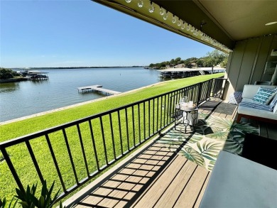 IT'S ALL ABOUT THE VIEW! This well-appointed waterfront condo is on De Cordova Bend Country Club in Texas - for sale on GolfHomes.com, golf home, golf lot