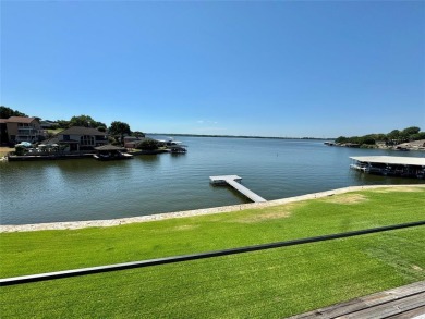 IT'S ALL ABOUT THE VIEW! This well-appointed waterfront condo is on De Cordova Bend Country Club in Texas - for sale on GolfHomes.com, golf home, golf lot