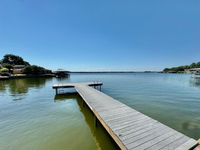 IT'S ALL ABOUT THE VIEW! This well-appointed waterfront condo is on De Cordova Bend Country Club in Texas - for sale on GolfHomes.com, golf home, golf lot