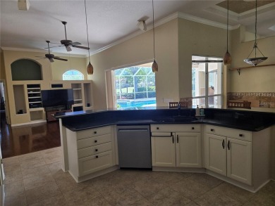 Now is the time for your opportunity to live directly on the Tom on Hunters Green Country Club in Florida - for sale on GolfHomes.com, golf home, golf lot