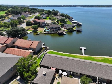 IT'S ALL ABOUT THE VIEW! This well-appointed waterfront condo is on De Cordova Bend Country Club in Texas - for sale on GolfHomes.com, golf home, golf lot