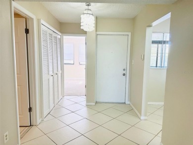 Discover the perfect blend of comfort, convenience, and income on Feather Sound Country Club in Florida - for sale on GolfHomes.com, golf home, golf lot