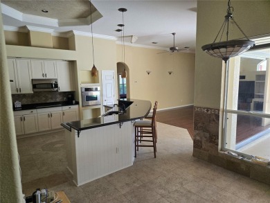 Now is the time for your opportunity to live directly on the Tom on Hunters Green Country Club in Florida - for sale on GolfHomes.com, golf home, golf lot
