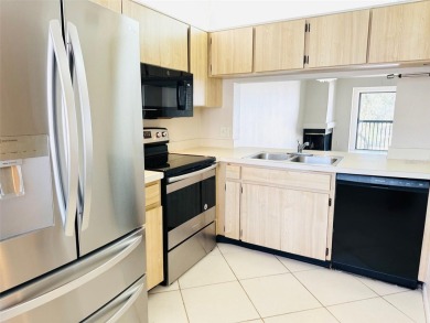 Discover the perfect blend of comfort, convenience, and income on Feather Sound Country Club in Florida - for sale on GolfHomes.com, golf home, golf lot