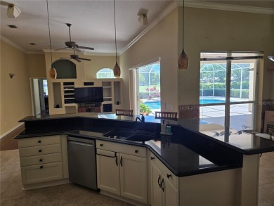 Now is the time for your opportunity to live directly on the Tom on Hunters Green Country Club in Florida - for sale on GolfHomes.com, golf home, golf lot