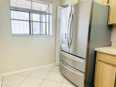Discover the perfect blend of comfort, convenience, and income on Feather Sound Country Club in Florida - for sale on GolfHomes.com, golf home, golf lot