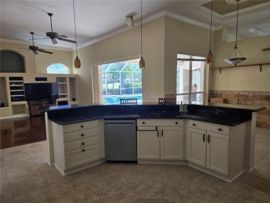 Now is the time for your opportunity to live directly on the Tom on Hunters Green Country Club in Florida - for sale on GolfHomes.com, golf home, golf lot