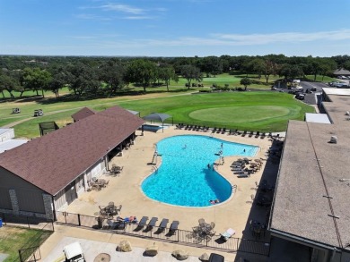 IT'S ALL ABOUT THE VIEW! This well-appointed waterfront condo is on De Cordova Bend Country Club in Texas - for sale on GolfHomes.com, golf home, golf lot