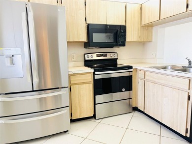 Discover the perfect blend of comfort, convenience, and income on Feather Sound Country Club in Florida - for sale on GolfHomes.com, golf home, golf lot