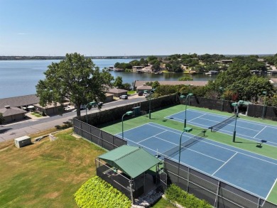 IT'S ALL ABOUT THE VIEW! This well-appointed waterfront condo is on De Cordova Bend Country Club in Texas - for sale on GolfHomes.com, golf home, golf lot