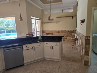 Now is the time for your opportunity to live directly on the Tom on Hunters Green Country Club in Florida - for sale on GolfHomes.com, golf home, golf lot