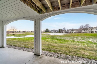 Welcome home to this stunning 2-bedroom, 2.5-bathroom condo with on The Links At Rolling Meadows in Michigan - for sale on GolfHomes.com, golf home, golf lot