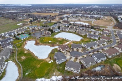 Welcome home to this stunning 2-bedroom, 2.5-bathroom condo with on The Links At Rolling Meadows in Michigan - for sale on GolfHomes.com, golf home, golf lot