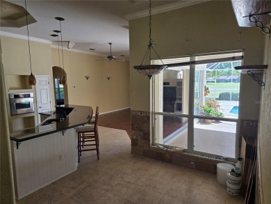 Now is the time for your opportunity to live directly on the Tom on Hunters Green Country Club in Florida - for sale on GolfHomes.com, golf home, golf lot