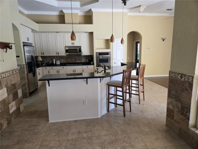 Now is the time for your opportunity to live directly on the Tom on Hunters Green Country Club in Florida - for sale on GolfHomes.com, golf home, golf lot