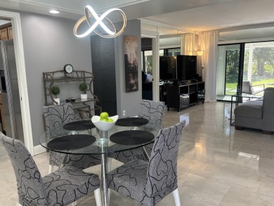 PRICED FOR A QUICK SALE! Beautifully upgraded first-floor condo on The President Country Club in Florida - for sale on GolfHomes.com, golf home, golf lot