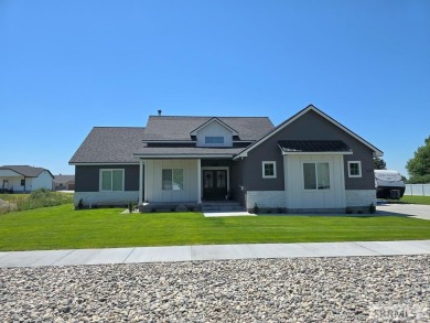 Don't miss out on this beautiful, nearly new, 4-bed, 2-bath home on Teton Lakes Golf Courses in Idaho - for sale on GolfHomes.com, golf home, golf lot