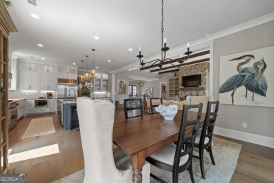 Luxury Lakefront Living. Welcome to 131 Cape View Lane, located on The Golf Club at Cuscowilla in Georgia - for sale on GolfHomes.com, golf home, golf lot