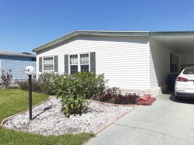 This waterfront 1792 sq ft 3 bedroom manufactured home is in 55+ on Schalamar Creek Golf and Country Club in Florida - for sale on GolfHomes.com, golf home, golf lot