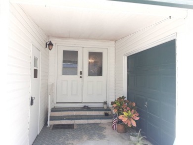 This waterfront 1792 sq ft 3 bedroom manufactured home is in 55+ on Schalamar Creek Golf and Country Club in Florida - for sale on GolfHomes.com, golf home, golf lot
