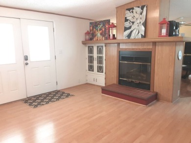 This waterfront 1792 sq ft 3 bedroom manufactured home is in 55+ on Schalamar Creek Golf and Country Club in Florida - for sale on GolfHomes.com, golf home, golf lot
